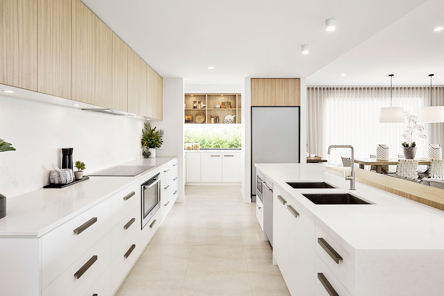 picture of a just remoded kitchen with white walls and white cabnets